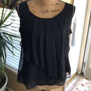 Beautiful black to with ruffles in the front